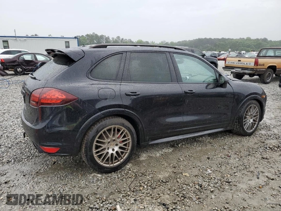 2013 Porsche Cayenne GTS с VIN WP1AD2A23DLA75220, выставлен на аукционе Copart как лот 55745765 с пробегом Не указан миль и Списание • Salvage title. История ставок и продаж доступна на DreamBid. Изображение 3.