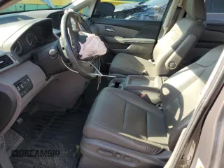 2016 Honda Odyssey Touring Elite with VIN 5FNRL5H91GB092214, listed as a Copart auction lot 61158745 with 121,477 mi miles and Salvage title. Bid and sale history available at DreamBid. Image 7.
