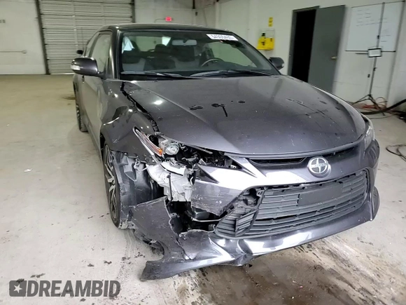 2016 Scion tC z VIN JTKJF5C75GJ022789, wystawiony jako Copart lot #54305435 z przebiegiem 49 007 mil mil oraz Szkody całkowita. Historia ofert i sprzedaży dostępna na DreamBid. Obrazek 13.