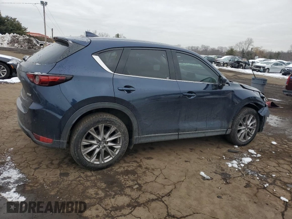 2019 Mazda CX-5 Grand Touring with VIN JM3KFBDM6K0667925, listed as a Copart auction lot 44657565 with 71,359 mi miles and Salvage Title. Bid and sale history available at carsss.com. Image 3.