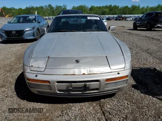 1986 Porsche 944 z VIN WP0AA0954GN155776, wystawiony jako Copart lot #56032785 z przebiegiem 17 696 mil mil oraz Szkoda całkowita • Salvage title. Historia ofert i sprzedaży dostępna na DreamBid. Obrazek 5.