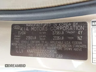 2005 Kia Spectra LX z VIN KNAFE122355118194, wystawiony jako IAAI lot #42454058 z przebiegiem 125 456 mil mil oraz . Historia ofert i sprzedaży dostępna na DreamBid. Obrazek 9.