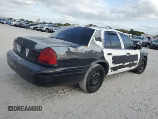 2005 Ford Police Interceptor with VIN 2FAFP71W35X128684, listed as a Copart auction lot 54002165 with 144,766 mi miles and Clean title. Bid and sale history available at DreamBid. Image 3.