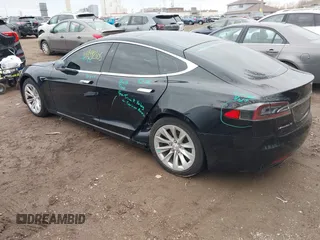 2017 Tesla Model S 100D with VIN 5YJSA1E25HF215778, listed as a IAAI auction lot 41692605 with Not Provided miles and . Bid and sale history available at DreamBid. Image 3.