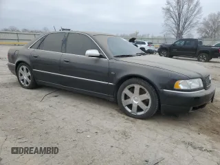 2001 Audi S8 z VIN WAUGU54DX1N012557, wystawiony jako Copart lot #85378574 z przebiegiem 102 562 mil mil oraz Tytuł czysty. Historia ofert i sprzedaży dostępna na DreamBid. Obrazek 4.