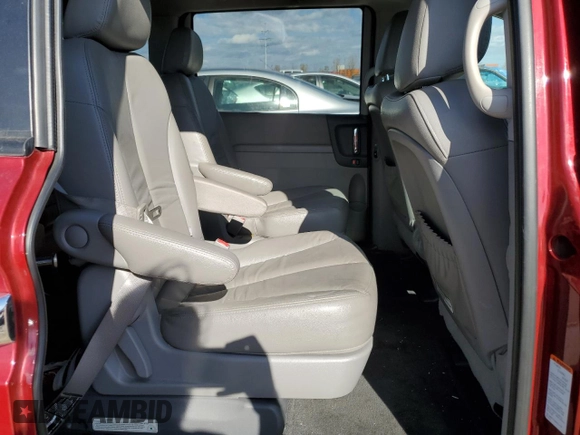 2011 Kia Sedona EX with VIN KNDMH4C72B6374068, listed as a Copart auction lot 79109454 with 104,860 mi miles and Salvage Title. Bid and sale history available at carsss.com. Image 11.