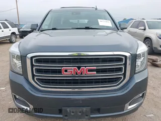 2019 GMC Yukon XL SLT with VIN 1GKS2GKC0KR345860, listed as a IAAI auction lot 40727072 with 127,568 mi miles and . Bid and sale history available at carsss.com. Image 13.