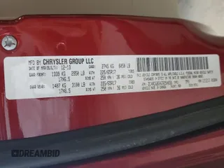 2014 Dodge Grand Caravan SE 30th Anniversary with VIN 2C4RDGBG4ER250658, listed as a Copart auction lot 54126535 with 85,980 mi miles and Non Repairable. Bid and sale history available at DreamBid. Image 13.