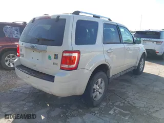 2011 Ford Escape Limited with VIN 1FMCU0EG4BKA28989, listed as a IAAI auction lot 42015694 with 271,226 mi miles. Bid and sale history available at carsss.com. Image 4.