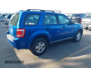 2011 Ford Escape XLS with VIN 1FMCU0C78BKC16059, listed as a IAAI auction lot 42577234 with 210,890 mi miles and . Bid and sale history available at DreamBid. Image 4.