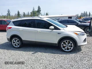 2016 Ford Escape Titanium with VIN 1FMCU9J93GUA40252, listed as a IAAI auction lot 42000778 with 37,914 mi miles. Bid and sale history available at carsss.com. Image 14.