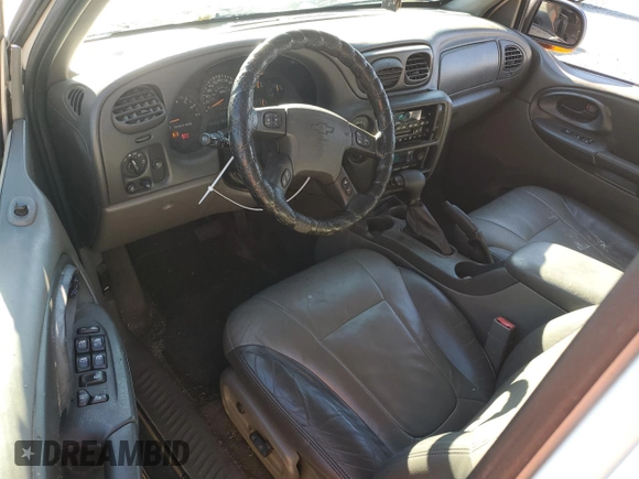 2003 Chevrolet TrailBlazer LTZ with VIN 1GNDT13S832260691, listed as a Copart auction lot 85911284 with 140,993 mi miles and Salvage Title. Bid and sale history available at DreamBid. Image 8.