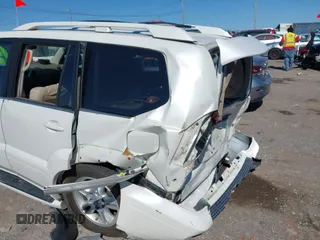 2007 Lexus GX with VIN JTJBT20X570145387, listed as a IAAI auction lot 42016545 with 153,907 mi miles and . Bid and sale history available at carsss.com. Image 6.