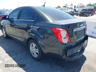 2014 Chevrolet Sonic LT with VIN 1G1JC5SB7E4146444, listed as a IAAI auction lot 42014386 with 85,122 mi miles and . Bid and sale history available at DreamBid. Image 3.