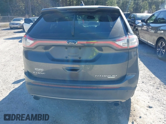 2015 Ford Edge Titanium z VIN 2FMTK3K90FBB13499, wystawiony jako IAAI lot #41492084 z przebiegiem 256 649 mil mil oraz . Historia ofert i sprzedaży dostępna na DreamBid. Obrazek 16.