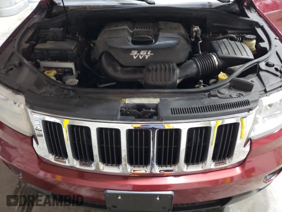 2013 Jeep Grand Cherokee Laredo с VIN 1C4RJFAG9DC619381, выставлен на аукционе Copart как лот 41836075 с пробегом 202 766 миль миль и Списание • Salvage title. История ставок и продаж доступна на DreamBid. Изображение 12.