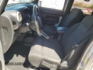 2012 Jeep Wrangler Unlimited Call of Duty MW3 with VIN 1C4BJWFG9CL199551, listed as a Copart auction lot 57097555 with 43,651 mi miles and Salvage title. Bid and sale history available at DreamBid. Image 7.