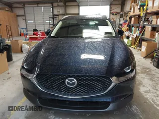 2022 Mazda CX-30 S Select z VIN 3MVDMBBL0NM440747, wystawiony jako IAAI lot #41864038 z przebiegiem 9667 mil mil oraz . Historia ofert i sprzedaży dostępna na DreamBid. Obrazek 6.