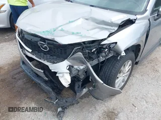 2013 Mazda CX-5 Touring with VIN JM3KE2CE3D0136911, listed as a IAAI auction lot 42095413 with 158,515 mi miles. Bid and sale history available at carsss.com. Image 6.