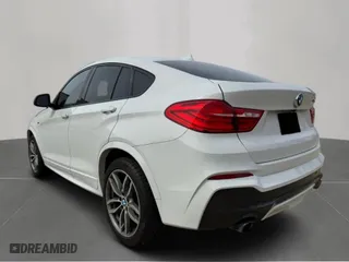 2018 BMW X4 M40i with VIN 5UXXW7C52J0W64992, listed as a Copart auction lot 53578695 with 97,697 mi miles and Clean Title. Bid and sale history available at carsss.com. Image 3.