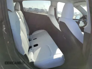 2023 Tesla Model Y Long Range z VIN 7SAYGDEE0PA206005, wystawiony jako Copart lot #50681145 z przebiegiem 31 989 mil mil oraz Szkoda całkowita • Salvage title. Historia ofert i sprzedaży dostępna na DreamBid. Obrazek 10.