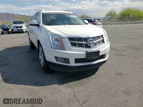 2012 Cadillac SRX Performance Collection with VIN 3GYFNBE33CS540914, listed as a Copart auction lot 54787125 with 130,357 mi miles and Salvage title. Bid and sale history available at DreamBid. Image 15.