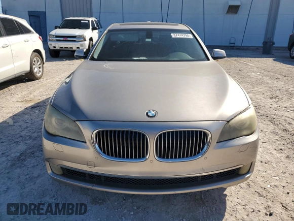 2012 BMW 7 Series 740Li with VIN WBAKB4C5XCC575773, listed as a Copart auction lot 87414794 with 88,115 mi miles and Clean Title. Bid and sale history available at carsss.com. Image 5.