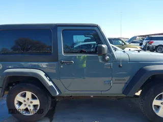 2014 Jeep Wrangler Sport with VIN 1C4AJWAGXEL177449, listed as a IAAI auction lot 41741519 with 117,056 mi miles and . Bid and sale history available at carsss.com. Image 13.