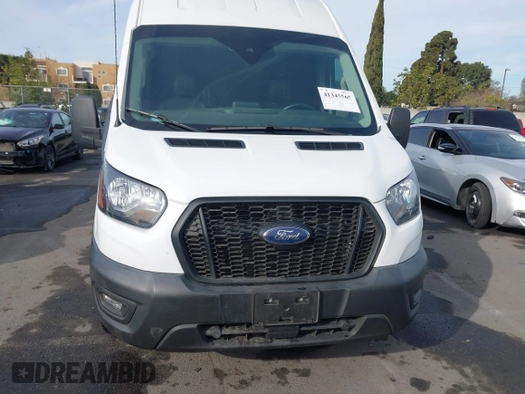 2021 Ford Transit Cargo with VIN 1FTBW3X82MKA19468, listed as a IAAI auction lot 41345565 with 67,485 mi miles. Bid and sale history available at carsss.com. Image 12.