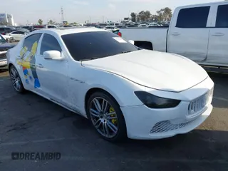 2015 Maserati Ghibli S Q4 z VIN ZAM57RTA7F1131581, wystawiony jako IAAI lot #41383443 z przebiegiem 72 865 mil mil oraz . Historia ofert i sprzedaży dostępna na DreamBid. Obrazek 1.