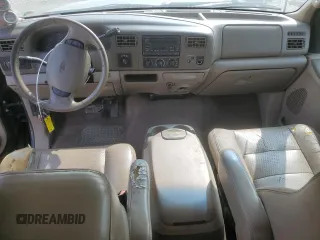 2001 Ford F-350 XL with VIN 1FTSX31F11ED72055, listed as a Copart auction lot 66164624 with 228,597 mi miles and Salvage Title. Bid and sale history available at DreamBid. Image 8.