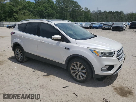 2018 Ford Escape Titanium with VIN 1FMCU0J99JUA06741, listed as a Copart auction lot 55782195 with 103,392 mi miles and Salvage title. Bid and sale history available at DreamBid. Image 4.
