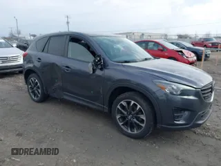2016 Mazda CX-5 Grand Touring with VIN JM3KE4DY5G0825695, listed as a IAAI auction lot 41813084 with 105,886 mi miles. Bid and sale history available at carsss.com. Image 1.