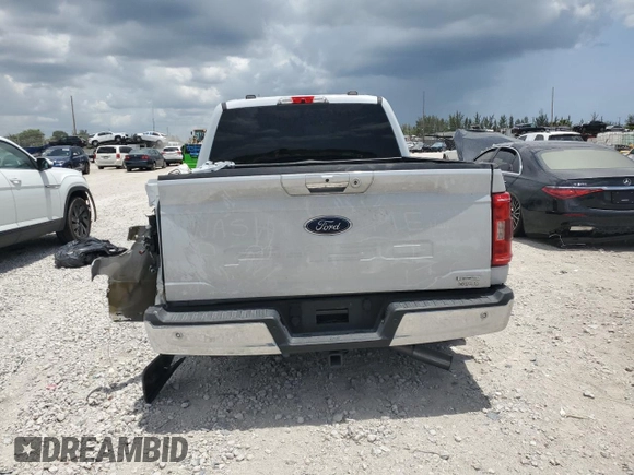 2021 Ford F-150 XL with VIN 1FTEW1CP2MKE62928, listed as a Copart auction lot 59882525 with 32,481 mi miles and Salvage title. Bid and sale history available at DreamBid. Image 6.