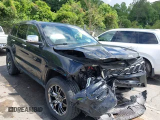2017 Jeep Grand Cherokee Laredo with VIN 1C4RJFAG9HC667386, listed as a IAAI auction lot 42244619 with 138,687 mi miles and . Bid and sale history available at DreamBid. Image 1.