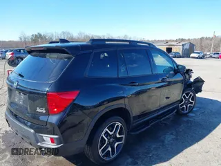 2023 Honda Passport Elite with VIN 5FNYF8H04PB006514, listed as a IAAI auction lot 41537826 with 14,640 mi miles and . Bid and sale history available at DreamBid. Image 4.
