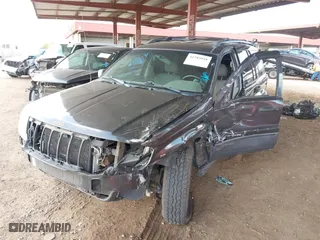 2004 Jeep Grand Cherokee Laredo with VIN 1J4GX48N64C436853, listed as a IAAI auction lot 41785918 with 118,578 mi miles. Bid and sale history available at carsss.com. Image 2.
