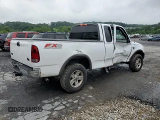 2003 Ford F-150 XL with VIN 1FTRX18L33NA43522, listed as a Copart auction lot 61197615 with 101,061 mi miles and Salvage title. Bid and sale history available at DreamBid. Image 3.