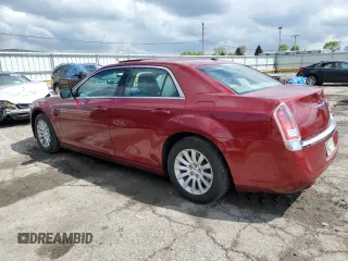 2013 Chrysler 300 z VIN 2C3CCAAGXDH727934, wystawiony jako Copart lot #55656025 z przebiegiem 100 567 mil mil oraz Szkoda całkowita • Salvage title. Historia ofert i sprzedaży dostępna na DreamBid. Obrazek 2.
