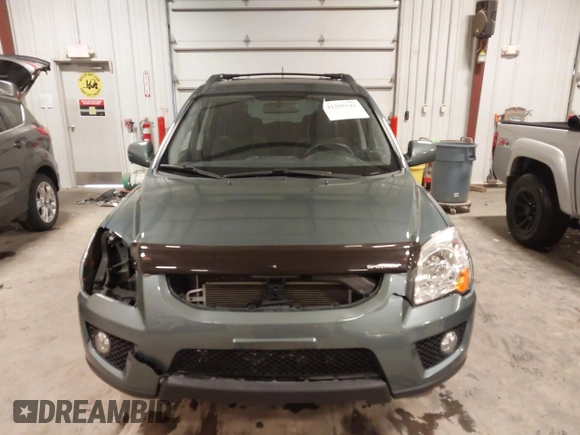 2009 Kia Sportage LX with VIN KNDJE723097558182, listed as a IAAI auction lot 41295142 with 147,200 mi miles. Bid and sale history available at carsss.com. Image 13.