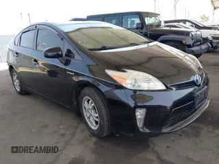 2012 Toyota Prius One z VIN JTDKN3DUXC1481432, wystawiony jako IAAI lot #42386235 z przebiegiem 130 285 mil mil oraz . Historia ofert i sprzedaży dostępna na DreamBid. Obrazek 1.