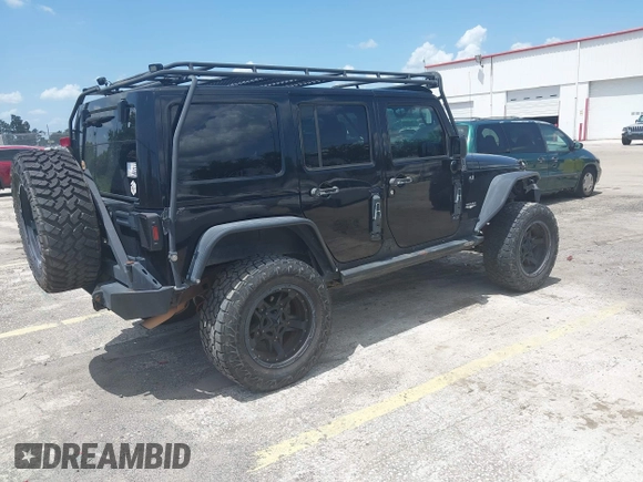2012 Jeep Wrangler Unlimited Altitude with VIN 1C4HJWEG5CL161049, listed as a IAAI auction lot 42629330 with 217,147 mi miles and . Bid and sale history available at DreamBid. Image 4.