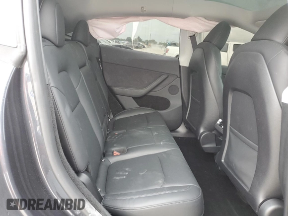 2024 Tesla Model Y Long Range with VIN 7SAYGDEE3RA253354, listed as a Copart auction lot 50524105 with 10,353 mi miles and Salvage Title. Bid and sale history available at DreamBid. Image 11.