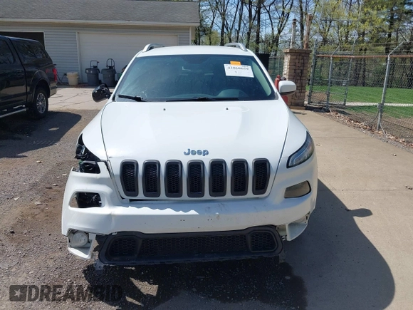 2015 Jeep Cherokee Latitude with VIN 1C4PJLCS3FW670254, listed as a IAAI auction lot 42060659 with 164,291 mi miles. Bid and sale history available at carsss.com. Image 13.