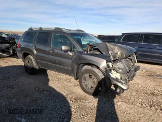 2004 Mitsubishi Endeavor XLS with VIN 4A4MN31S64E090132, listed as a Copart auction lot 87889275 with 375,306 mi miles and Salvage Title. Bid and sale history available at carsss.com. Image 4.