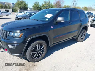 2021 Jeep Grand Cherokee Trailhawk with VIN 1C4RJFLGXMC698606, listed as a IAAI auction lot 41901479 with 50,086 mi miles. Bid and sale history available at carsss.com. Image 2.