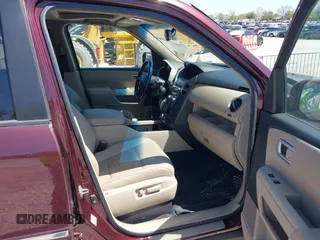 2012 Honda Pilot Touring with VIN 5FNYF4H90CB020623, listed as a IAAI auction lot 42048740 with 162,504 mi miles. Bid and sale history available at carsss.com. Image 5.