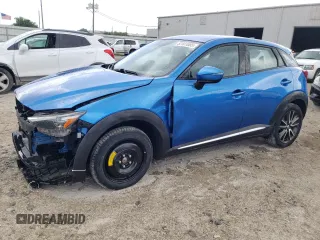 2016 Mazda CX-3 Grand Touring with VIN JM1DKBD72G0106104, listed as a Copart auction lot 52581085 with 76,603 mi miles and Salvage Title. Bid and sale history available at carsss.com. Image 1.