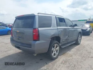 2019 Chevrolet Tahoe LT z VIN 1GNSCBKC8KR406519, wystawiony jako IAAI lot #42145021 z przebiegiem 74 694 mil mil oraz . Historia ofert i sprzedaży dostępna na DreamBid. Obrazek 4.