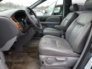 2001 Toyota Sienna LE with VIN 4T3ZF13C21U354424, listed as a Copart auction lot 50260675 with 235,787 mi miles and Non Repairable. Bid and sale history available at carsss.com. Image 7.